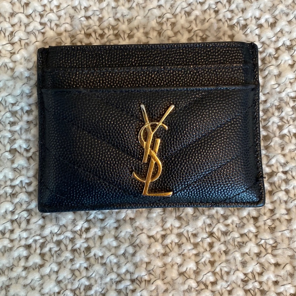 Authentic YSL card holder. Gold hardware. Black pebbled leather.